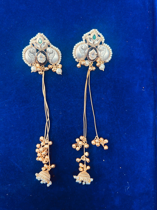 Traditional Indian Kundan Peacock Jhumka Earrings with Long Gold Chains and Pearls.